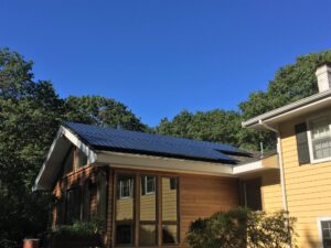 house with solar panels on roof